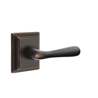 Emtek Basel Lever with Wilshire Rosette in Unlacquered Brass