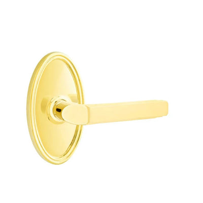 Emtek Milano Lever with Oval Rosette in Unlacquered Brass