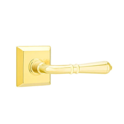 Emtek Turino Lever with Quincy Rosette in Unlacquered Brass