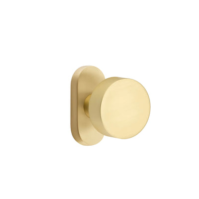 Emtek Round Knob with Oval Stretto 1-1/2" x 3" in Satin Brass