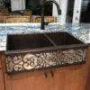 33″ Hammered Copper Apron Front 60/40 Double Basin Kitchen Sink w/ Scroll Design and Apron Front Nickel Background - Hardware by Design